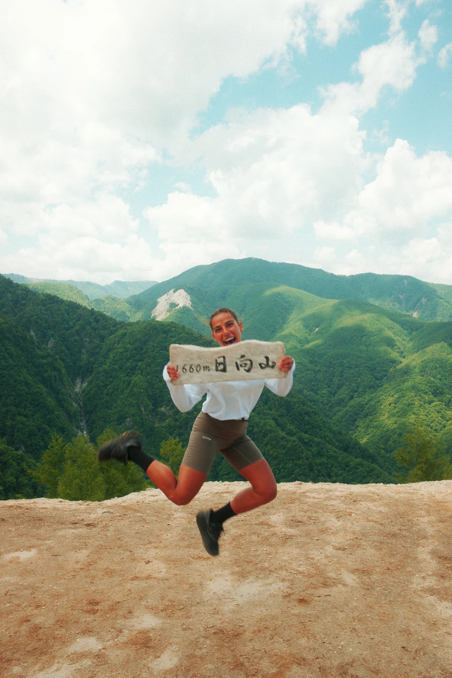 Celebrating at a summit marker