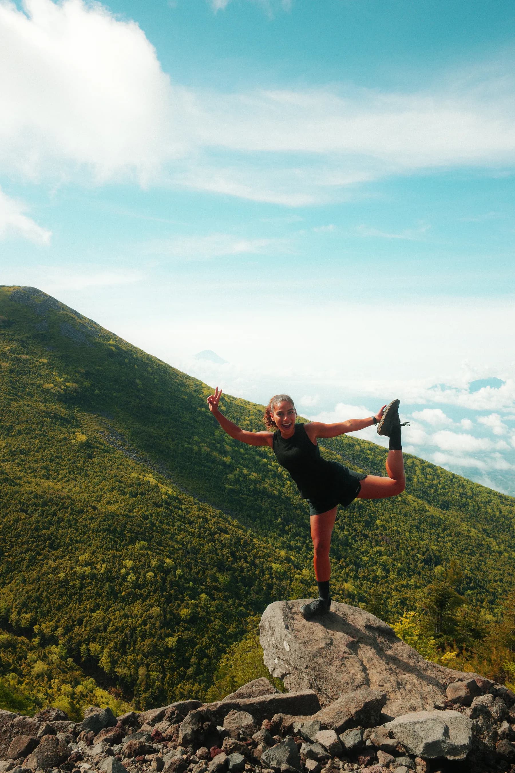 A playful balance pose on a ridge